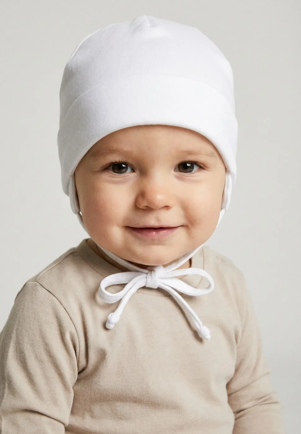 OCS Beanie mit Ohrenklappen & Bindeband aus Bio-Baumwolle