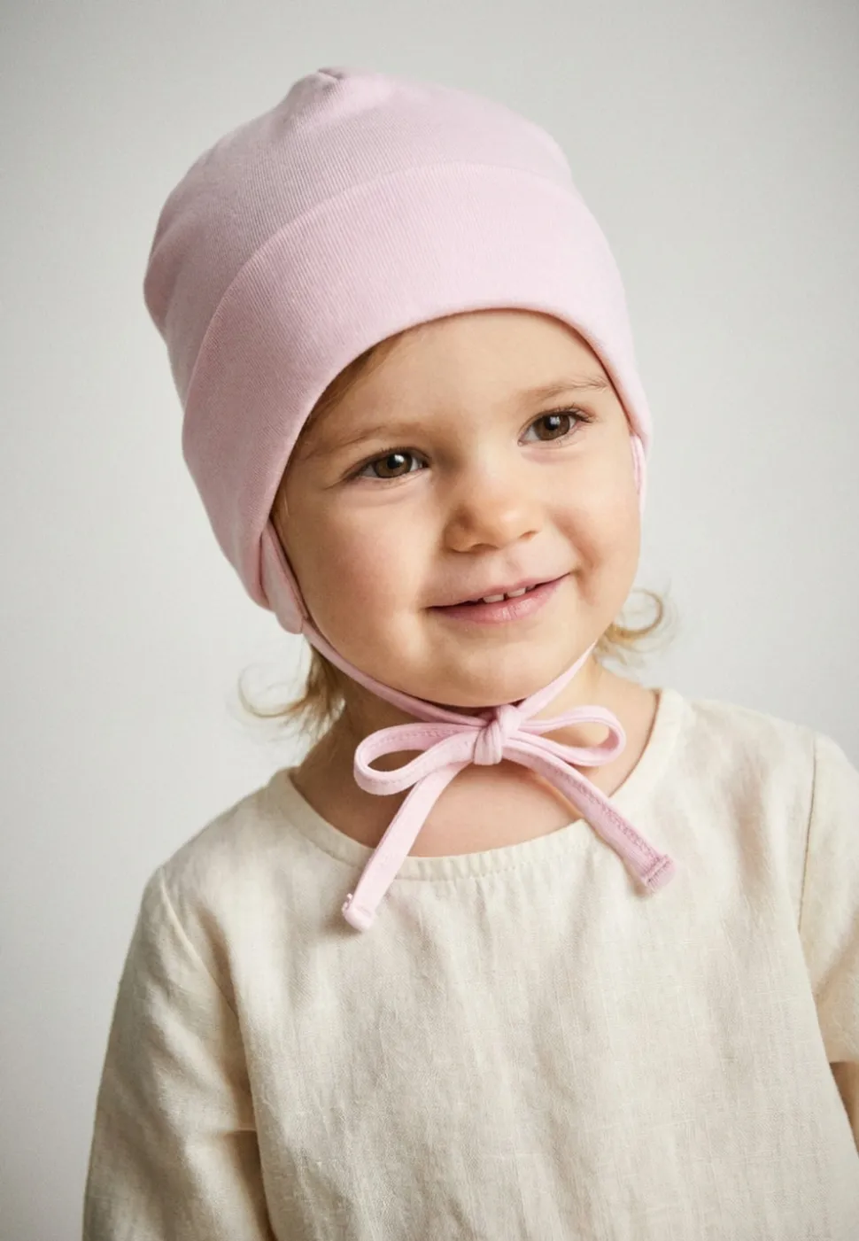 OCS Beanie mit Ohrenklappen & Bindeband aus Bio-Baumwolle